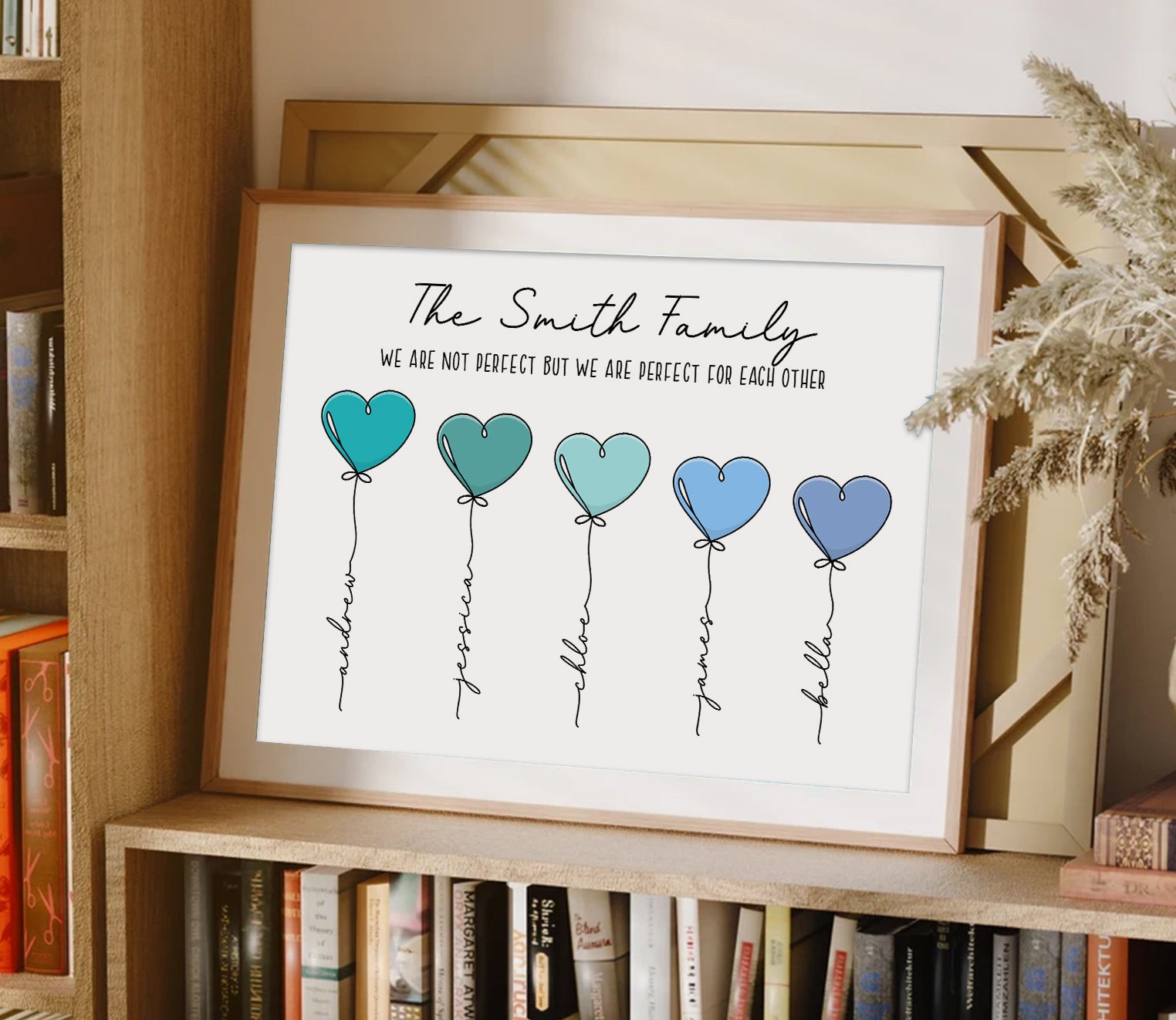 Personalized heart balloon family print with four custom names and quote in a wooden frame